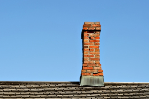 brick chimney in center of home