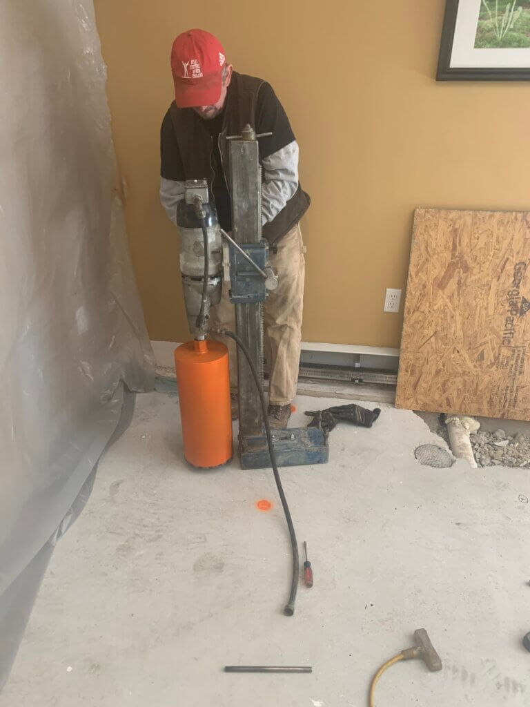 Dennis coring through the floor slab