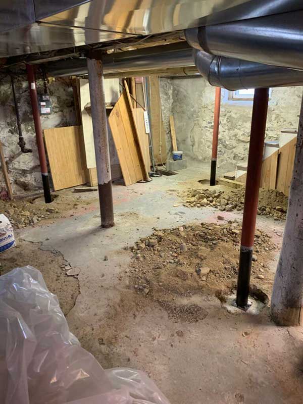 working on foundation in basement in cape cod