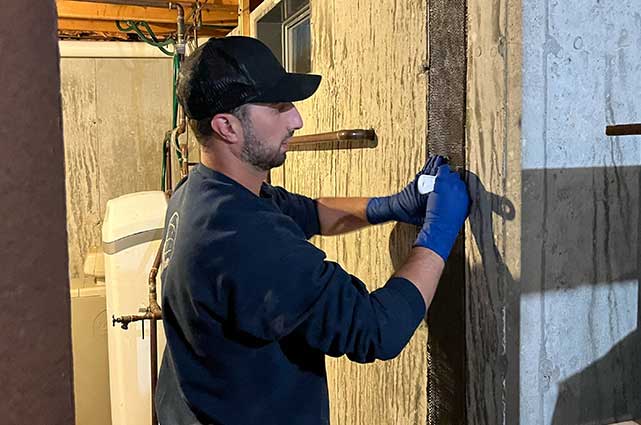 engineer working on a cape cod foundation repair